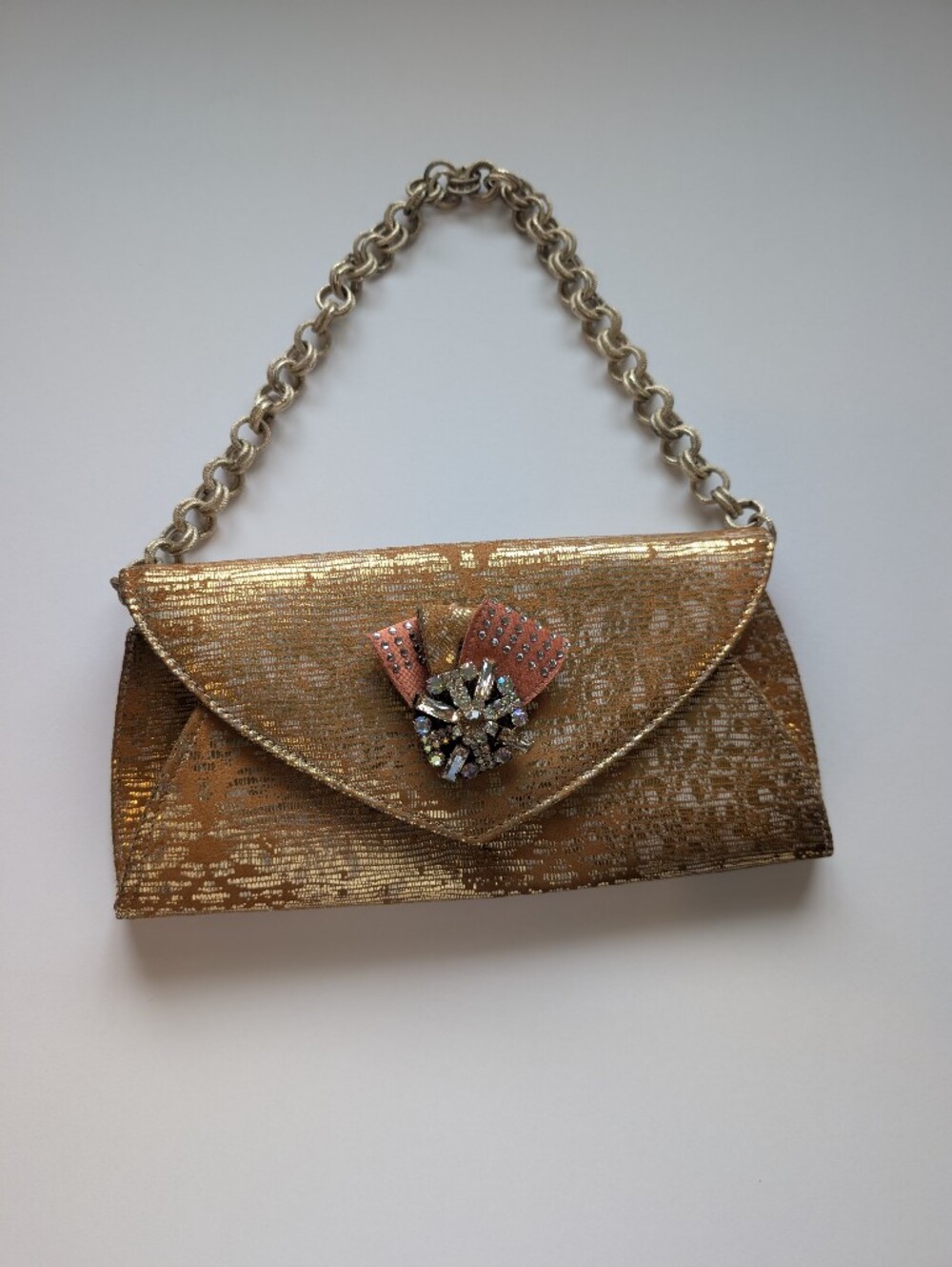 Gold Metallic Evening Clutch with Decorative Jewel Accent